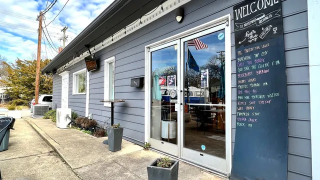 a view of a chairs and table in the patio