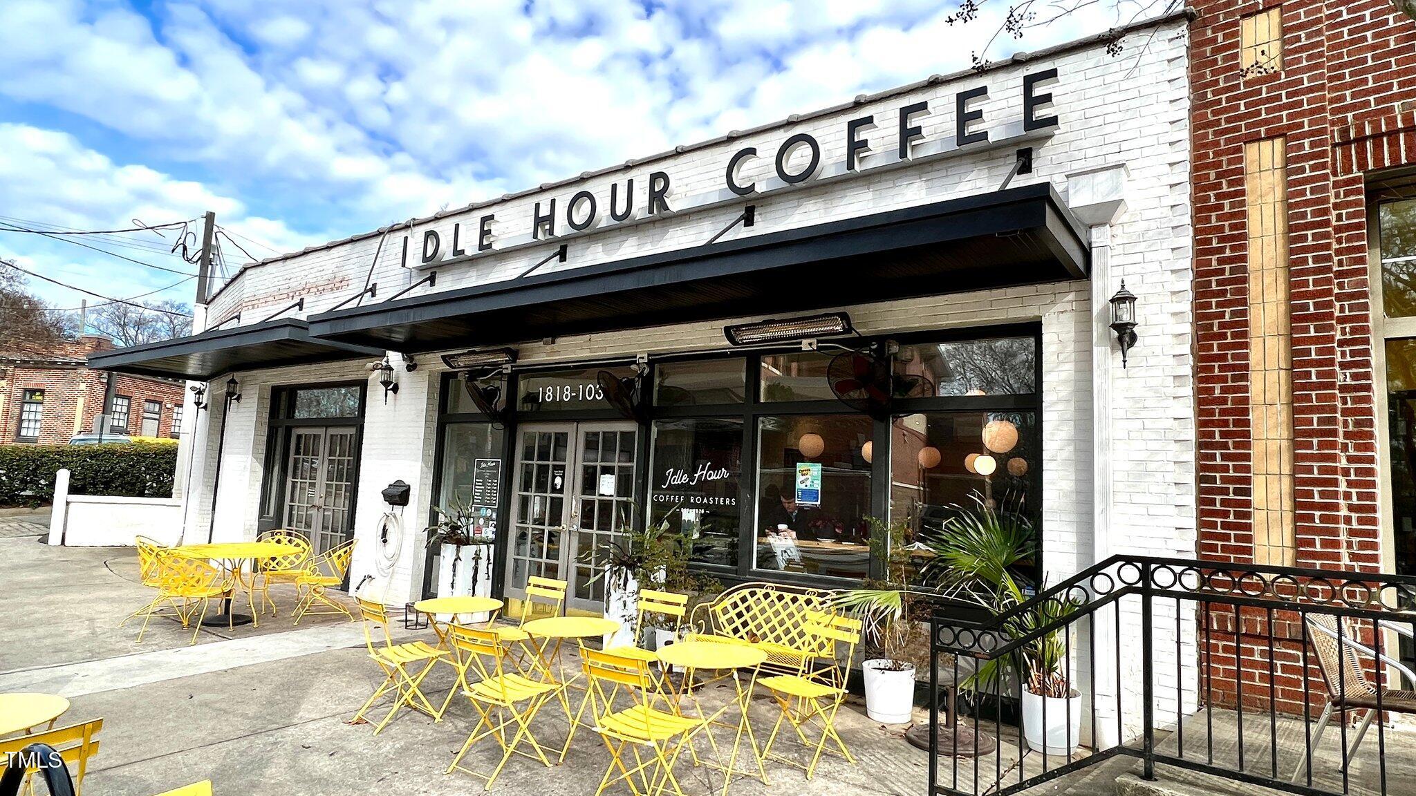 921 St Marys Street Raleigh, NC 27605 - Photo 40 of 42 a front view of a building with glass door and glass windows