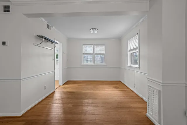 a view of a room that has a window in it