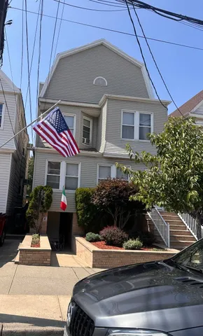 a front view of house with yard