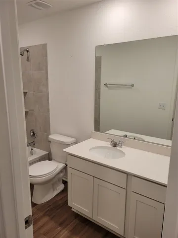 a bathroom with a sink and a toilet