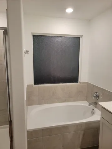 a bathroom with a bathtub