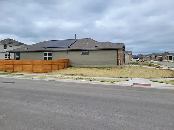 a view of swimming pool with an ocean view