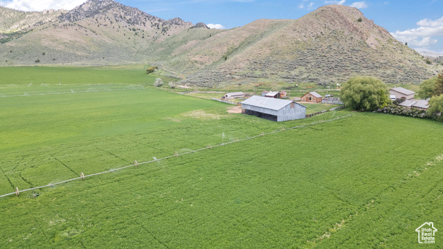 1657 Reed Lane Soda Springs, ID 83276 - Photo 4 of 6 View of rural area featuring a mountain backdrop and agricultural land