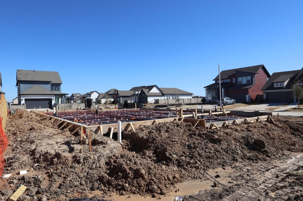 5523 Bonfire Alley Manvel, TX 77578 - Photo 12 of 19 a view of a houses with a yard