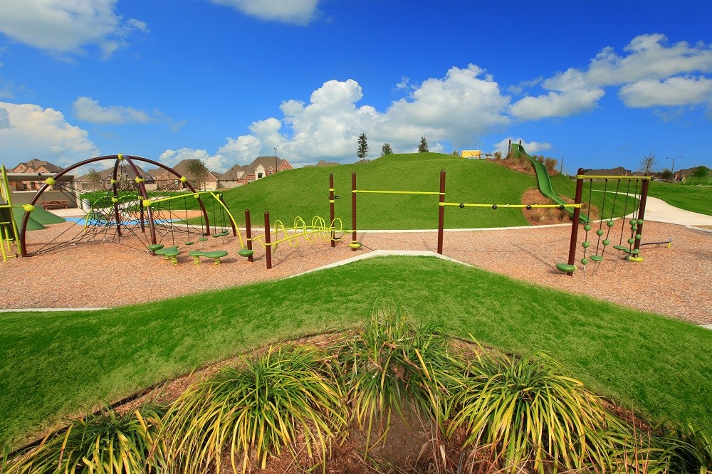 5523 Bonfire Alley Manvel, TX 77578 - Photo 16 of 19 a view of a garden with a slide