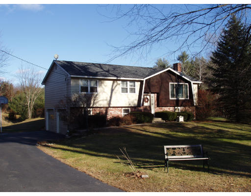 2 Proctor Road Townsend, MA 01469 - Photo 1 of 1 a front view of a house with a yard