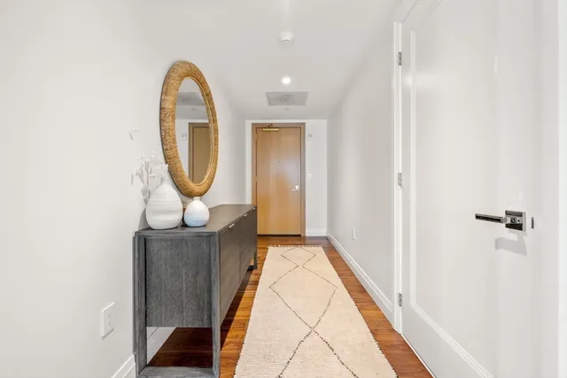 a view of a hallway with entryway