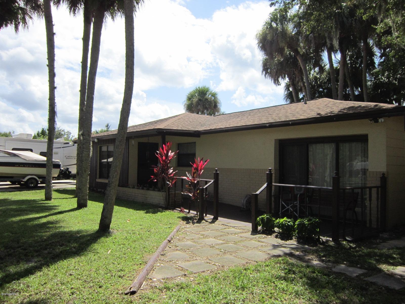 855 Pine Island Road Merritt Island, FL 32953 - Photo 1 of 21 Front 2
