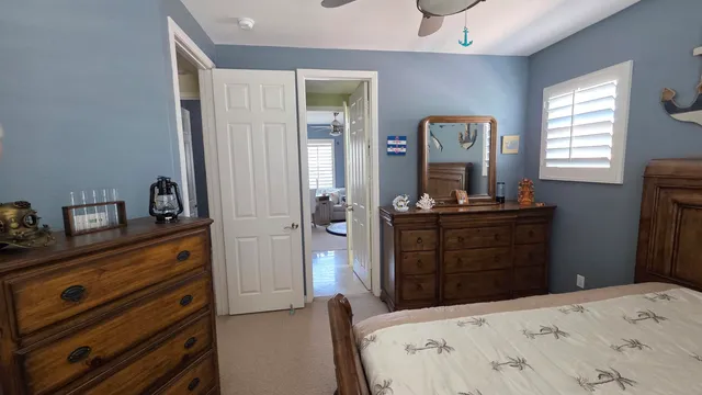 a en suite bathroom with a sink a toilet and a shower