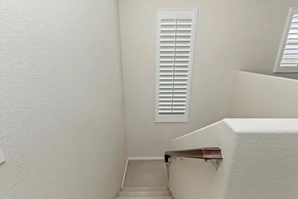 a view of a room with a window