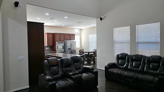 a living room with furniture and a couch