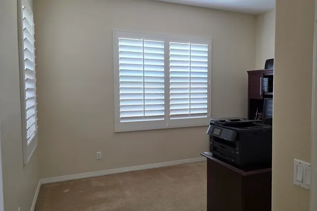 an empty room with a window