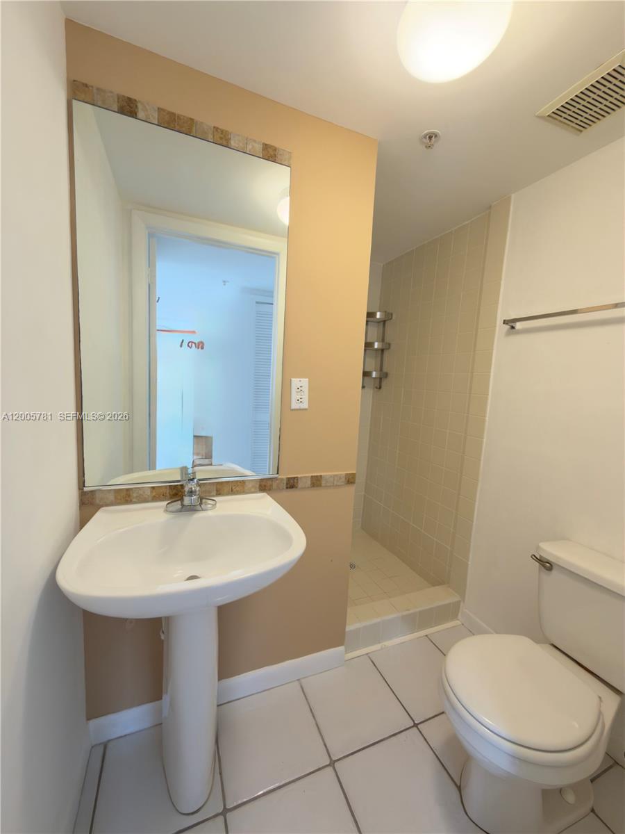 3052 Southwest 27th Avenue, Unit 204 Miami, FL 33133 - Photo 24 of 29 2nd full bathroom
