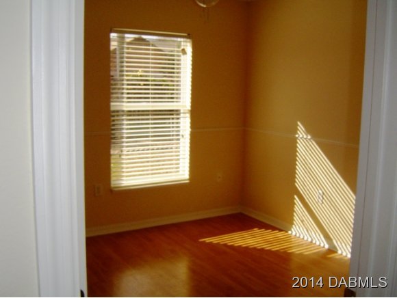 1710 Concert Road Deltona, FL 32738 - Photo 14 of 20 a view of an empty room with a window
