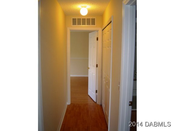 1710 Concert Road Deltona, FL 32738 - Photo 15 of 20 a view of a bathroom from a hallway