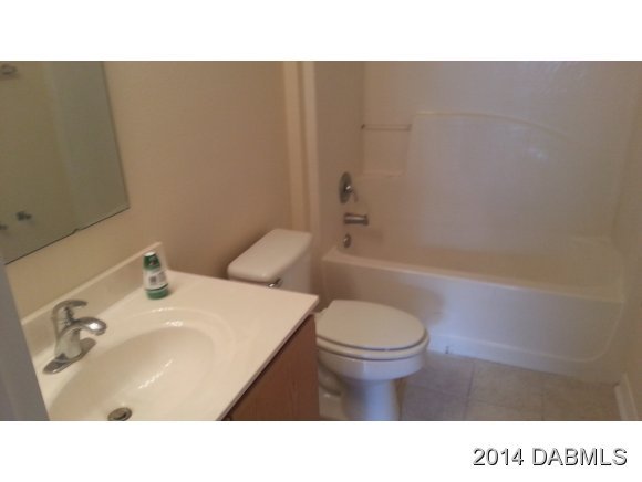 1710 Concert Road Deltona, FL 32738 - Photo 4 of 20 a bathroom with a sink toilet and bathtub