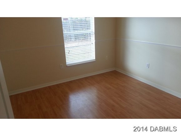 1710 Concert Road Deltona, FL 32738 - Photo 6 of 20 a open hall with a window