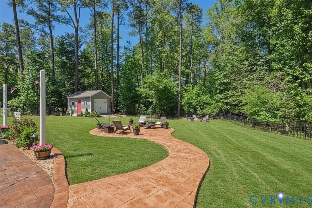 6446 Chestnut Church Road Mechanicsville, VA 23116 - Photo 46 of 49 Expansive lawn featuring a stamped concrete patio
