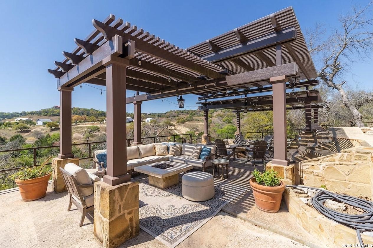 198 Echo Falls Road Comfort, TX 78013 - Photo 21 of 28 a view of a patio with chairs and plants