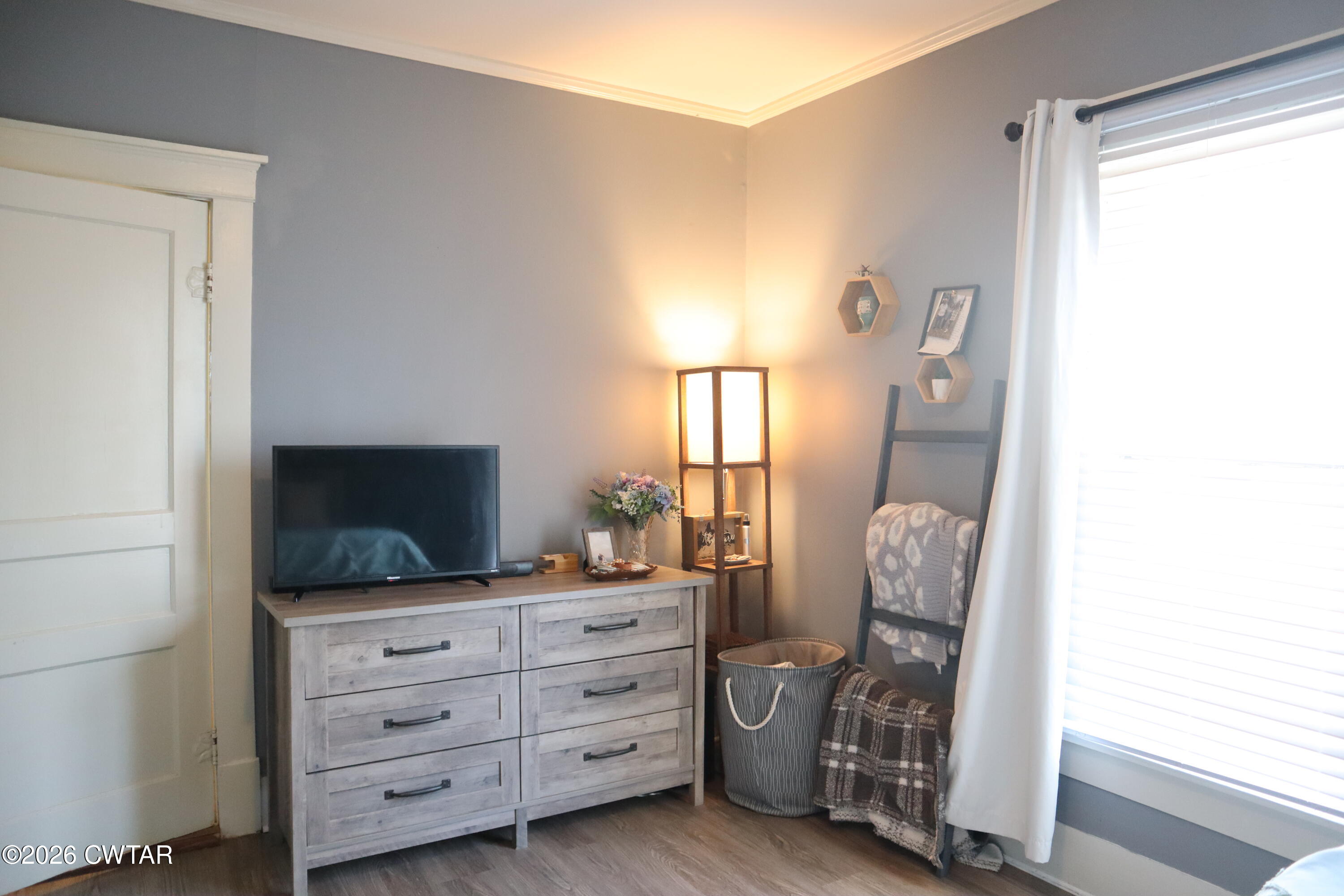 4817 R J Welch Road Friendship, TN 38034 - Photo 12 of 18 a room with furniture and flat screen tv