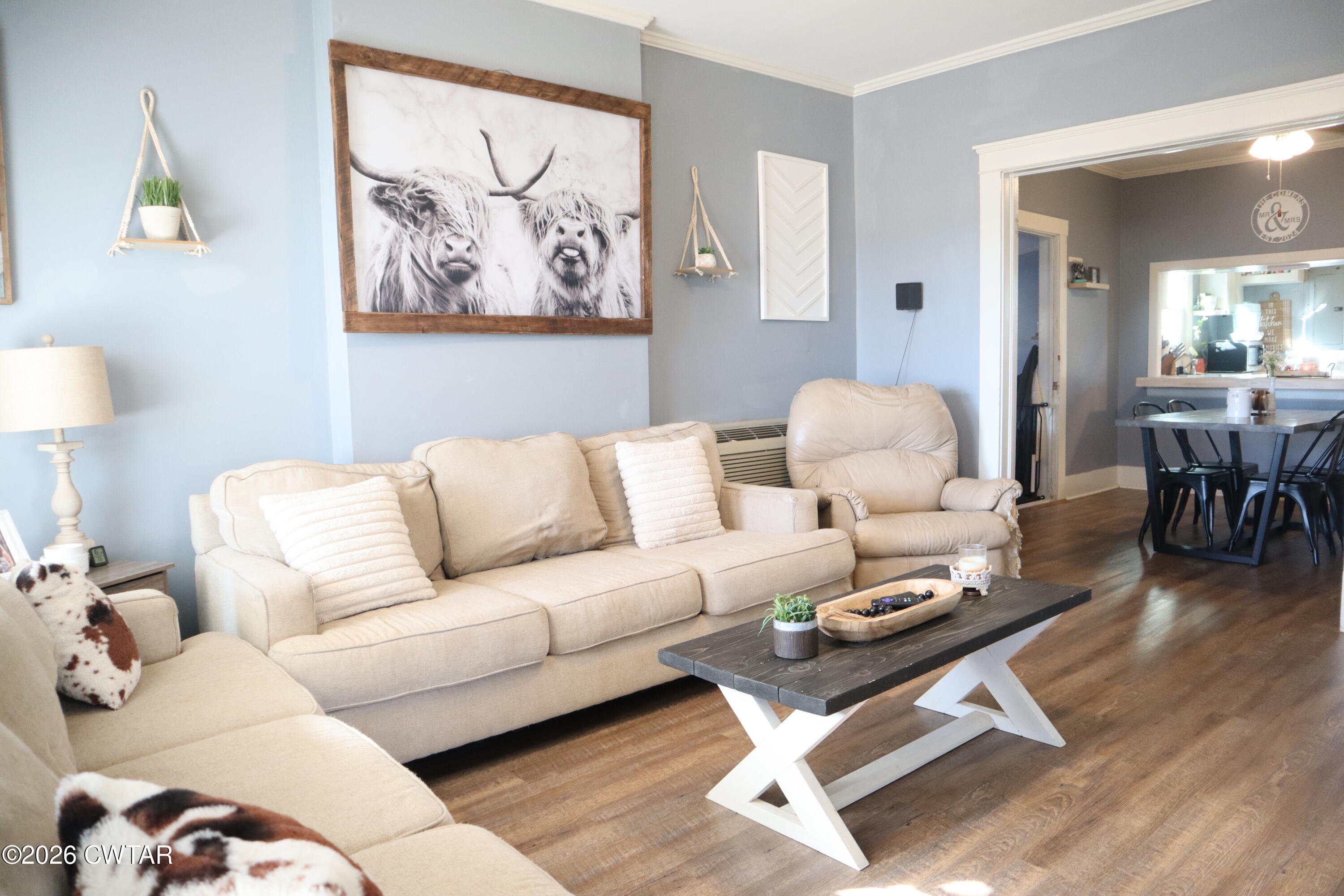 4817 R J Welch Road Friendship, TN 38034 - Photo 2 of 18 a living room with furniture a rug and wall painting