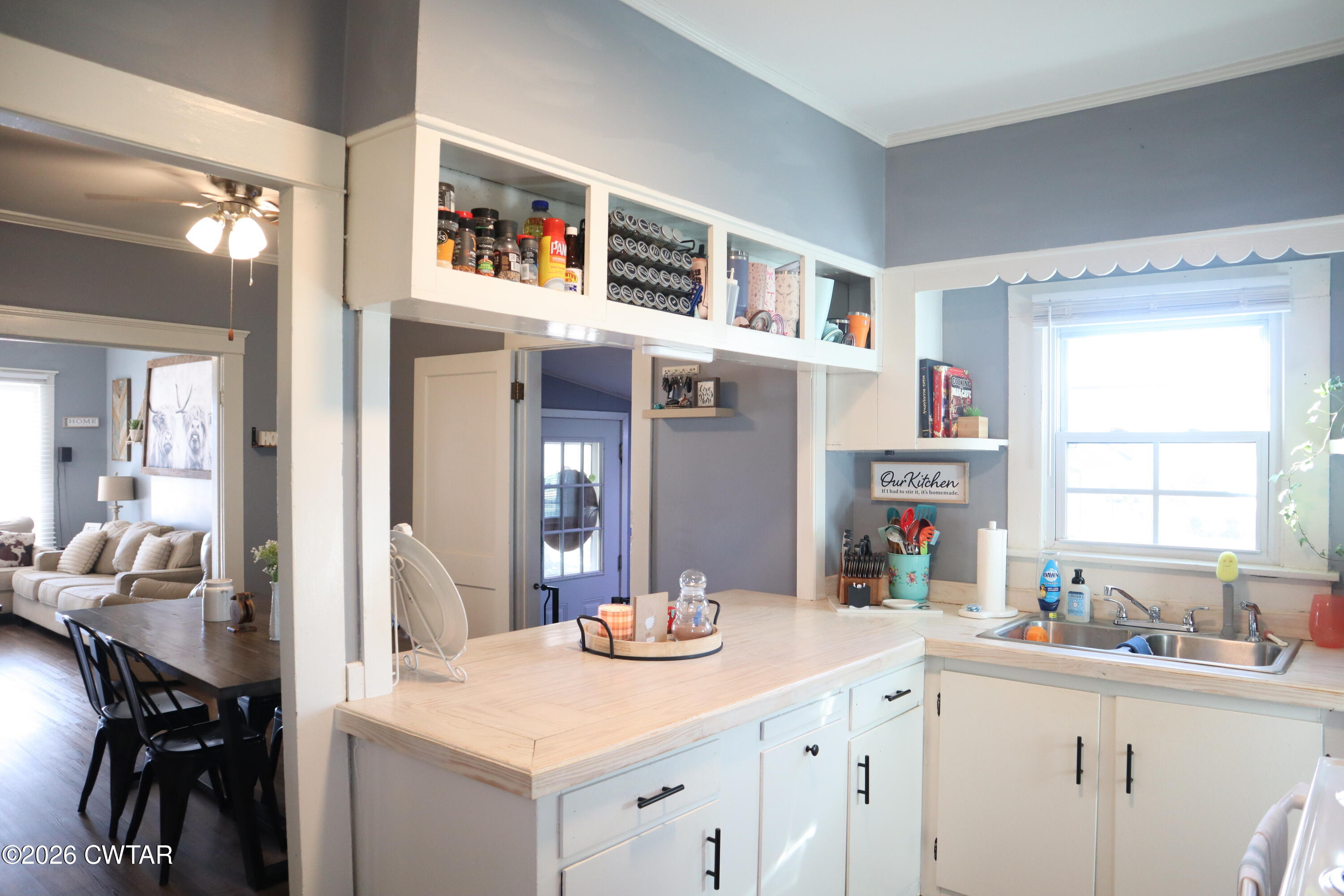 4817 R J Welch Road Friendship, TN 38034 - Photo 8 of 18 a kitchen with cabinets and window