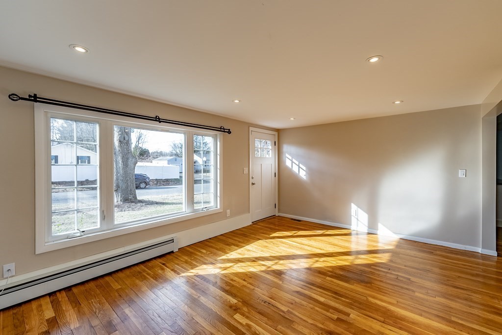 22 Ridge Road South Hadley, MA 01075 - Photo 11 of 36 a view of empty room with wooden floor and fan