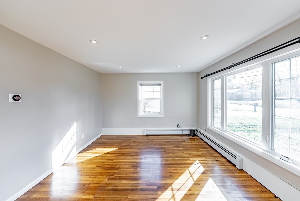 22 Ridge Road South Hadley, MA 01075 - Photo 12 of 36 a view of empty room with wooden floor and fan