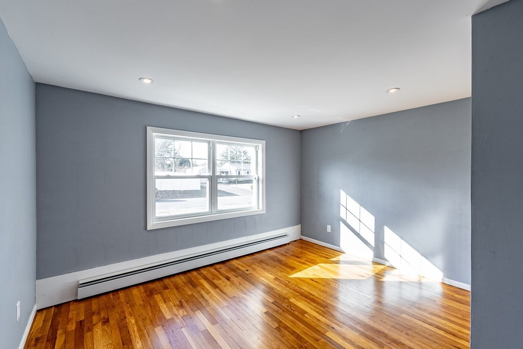 22 Ridge Road South Hadley, MA 01075 - Photo 21 of 36 a view of empty room with wooden floor and fan