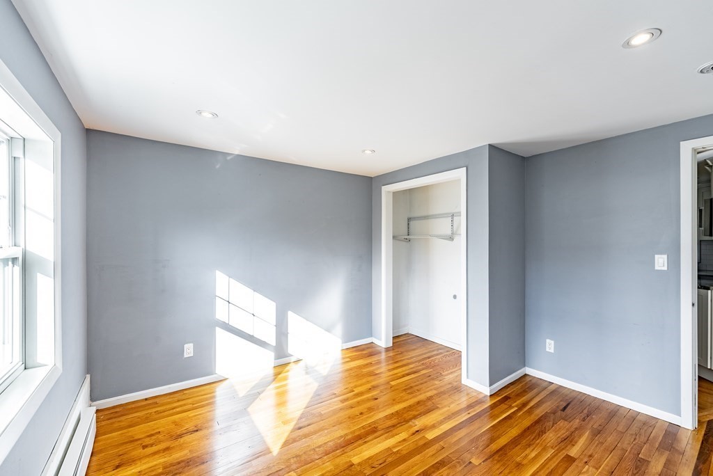 22 Ridge Road South Hadley, MA 01075 - Photo 22 of 36 a view of a bedroom with wooden floor and bedroom