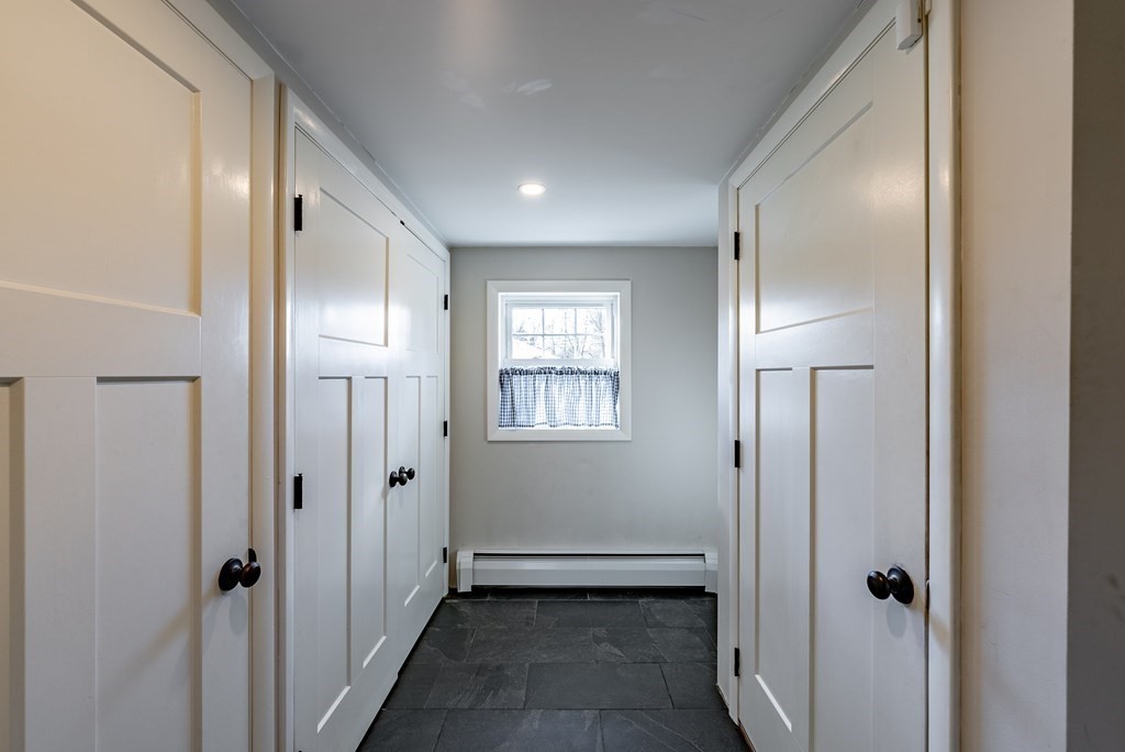 22 Ridge Road South Hadley, MA 01075 - Photo 24 of 36 a view of a hallway with wooden floor and closet area