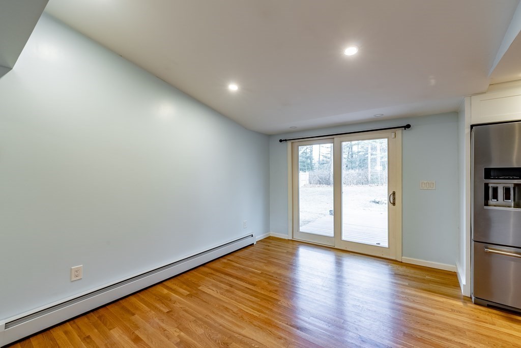 22 Ridge Road South Hadley, MA 01075 - Photo 6 of 36 a view of empty room with wooden floor and fan