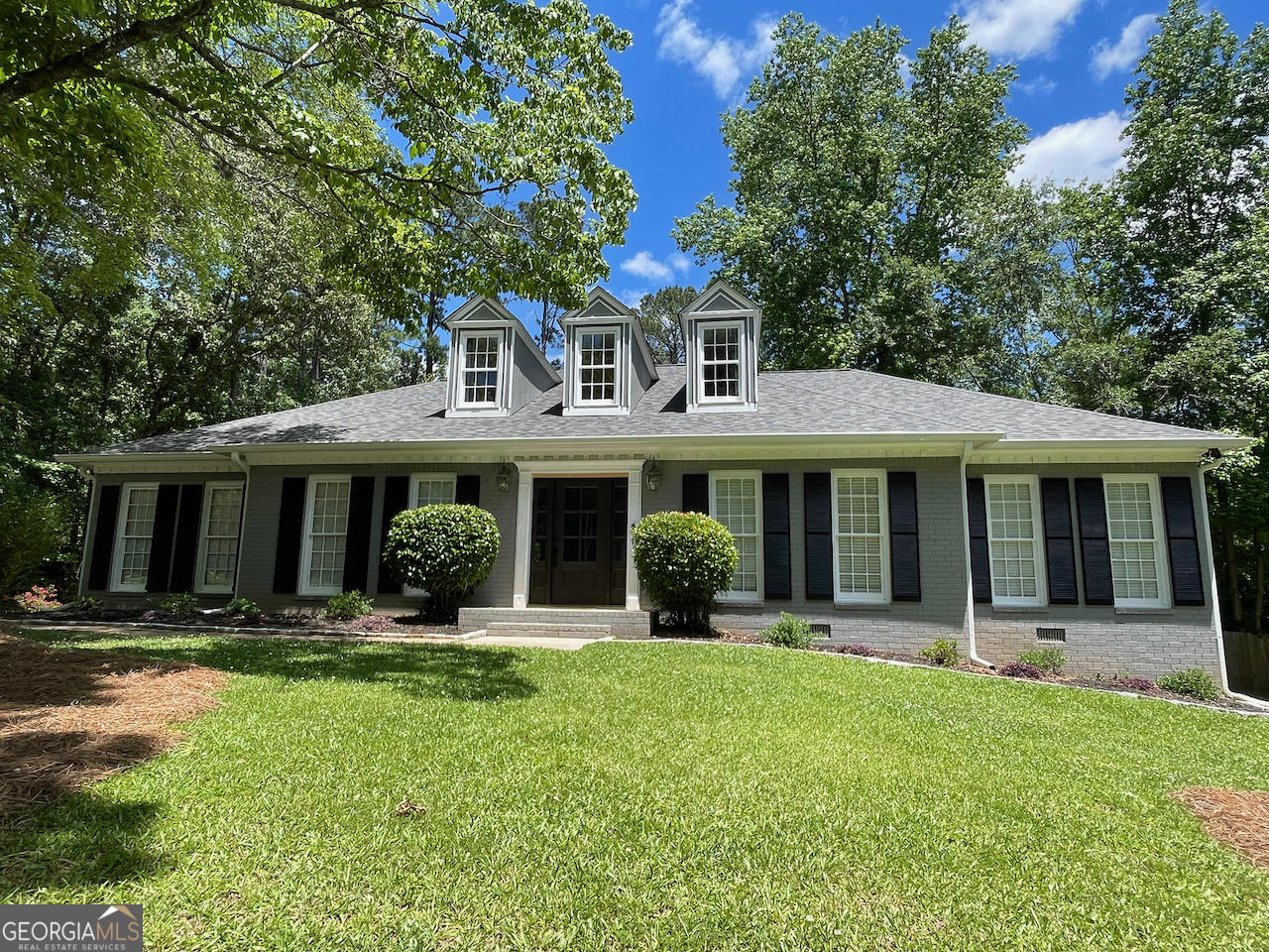 330 Walnut Grove Road Peachtree City, GA 30269 - Photo 1 of 1 a front view of a house with a yard