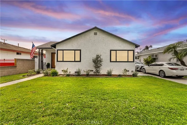 a house view with a garden space