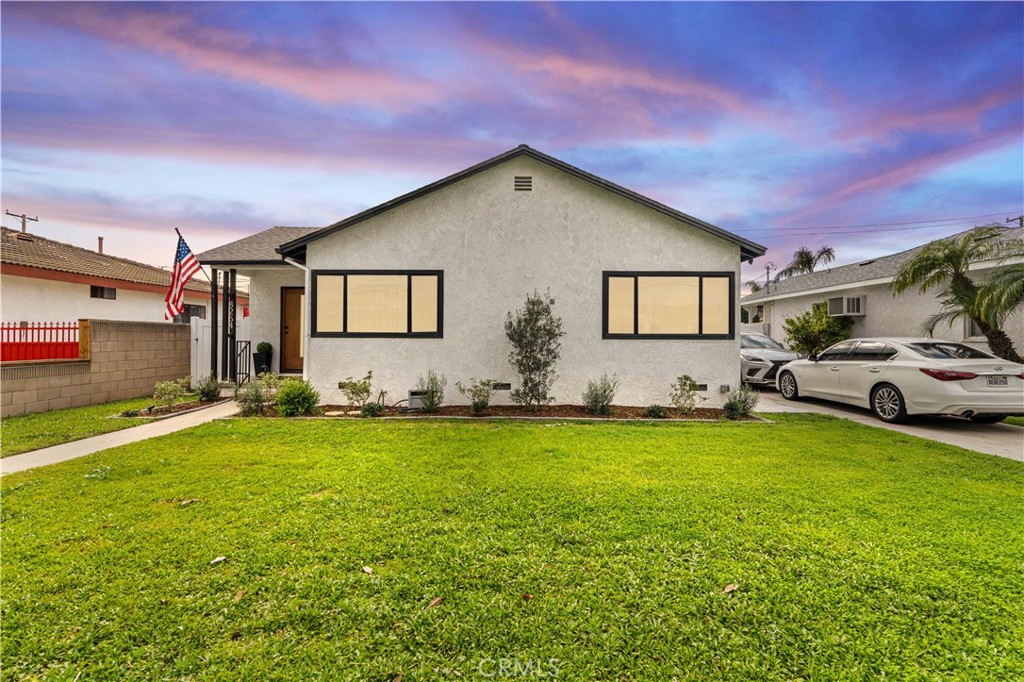 8254 Stewart And Gray Road Downey, CA 90241 - Photo 1 of 1 a house view with a garden space