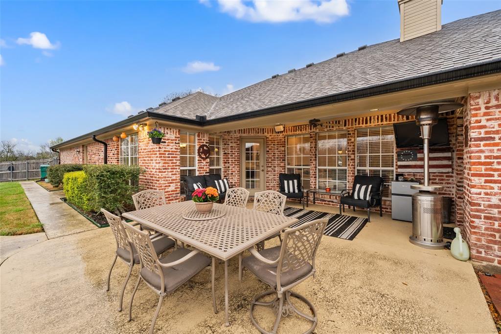 517 Chado Lane Robinson, TX 76706 - Photo 32 of 40 View of patio / terrace featuring outdoor dining space