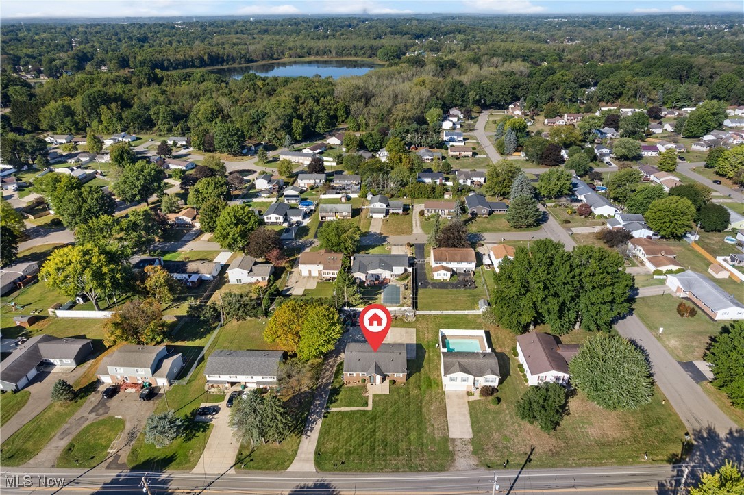 703 Perry Drive Northwest Canton, OH 44708 - Photo 6 of 9 Aerial view of property and surrounding area featuring nearby suburban area