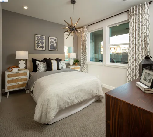 a bed room with a bed and a couch