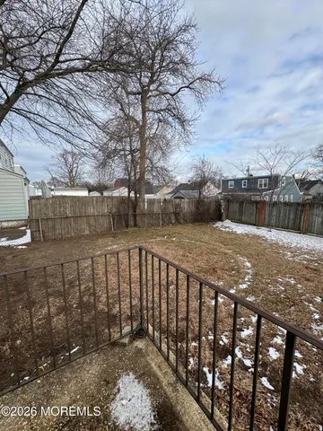 a view of balcony with wooden floor