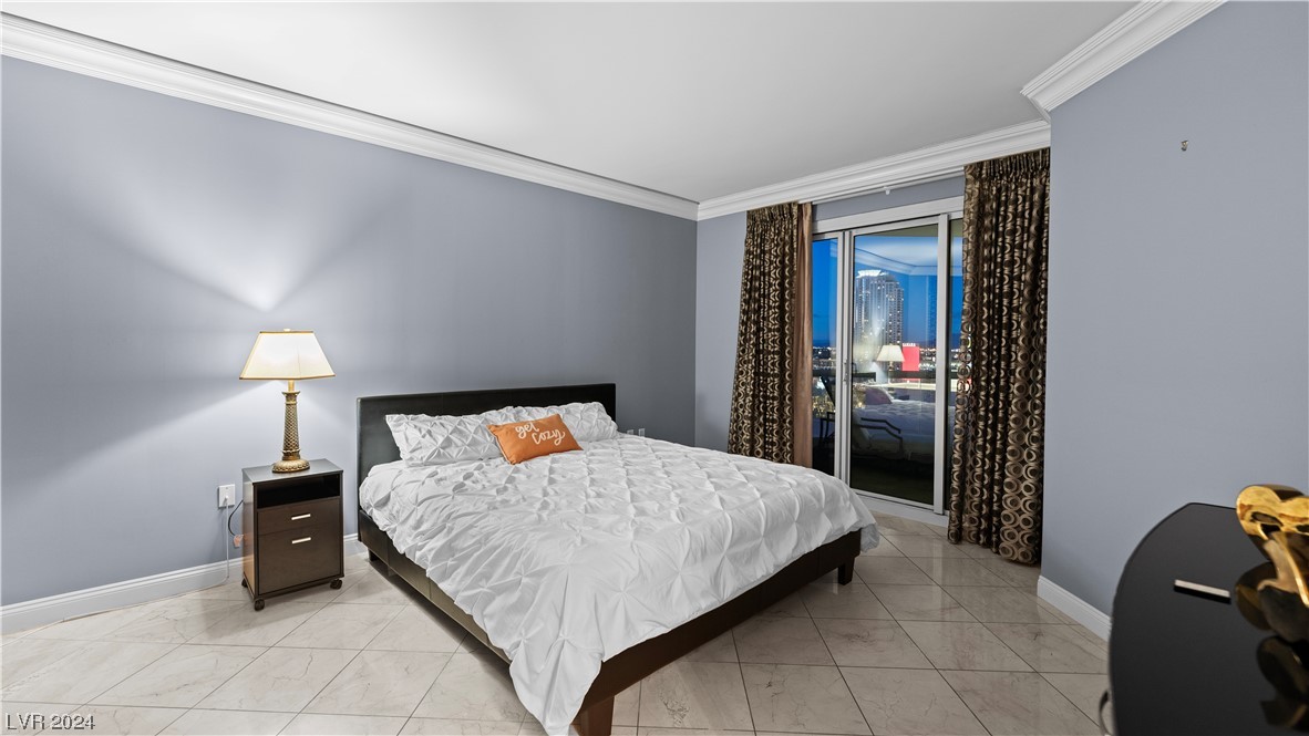 2777 Paradise Road, Unit 1503 Las Vegas, NV 89109 - Photo 37 of 78 Primary En Suite Bedroom at Night