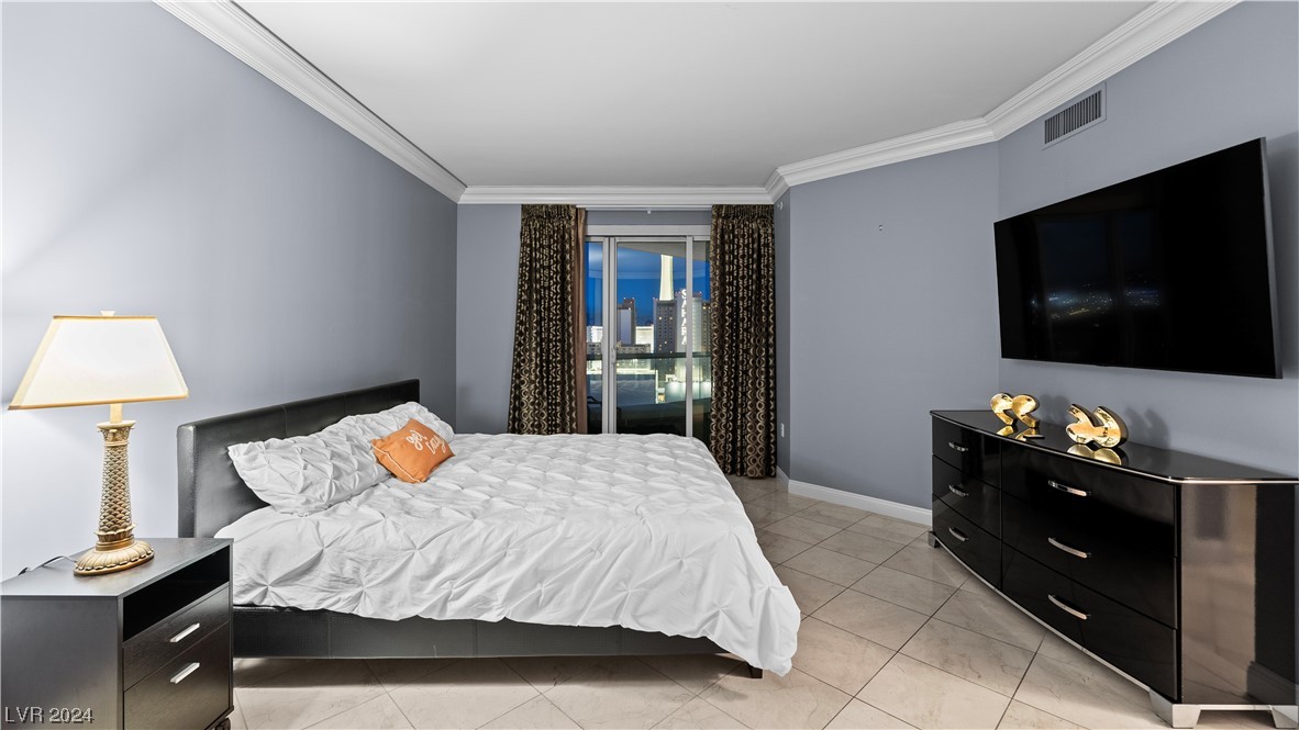2777 Paradise Road, Unit 1503 Las Vegas, NV 89109 - Photo 38 of 78 Primary En Suite Bedroom at Night
