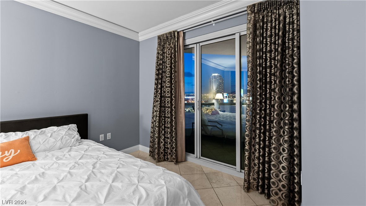 2777 Paradise Road, Unit 1503 Las Vegas, NV 89109 - Photo 39 of 78 Primary En Suite Bedroom at Night