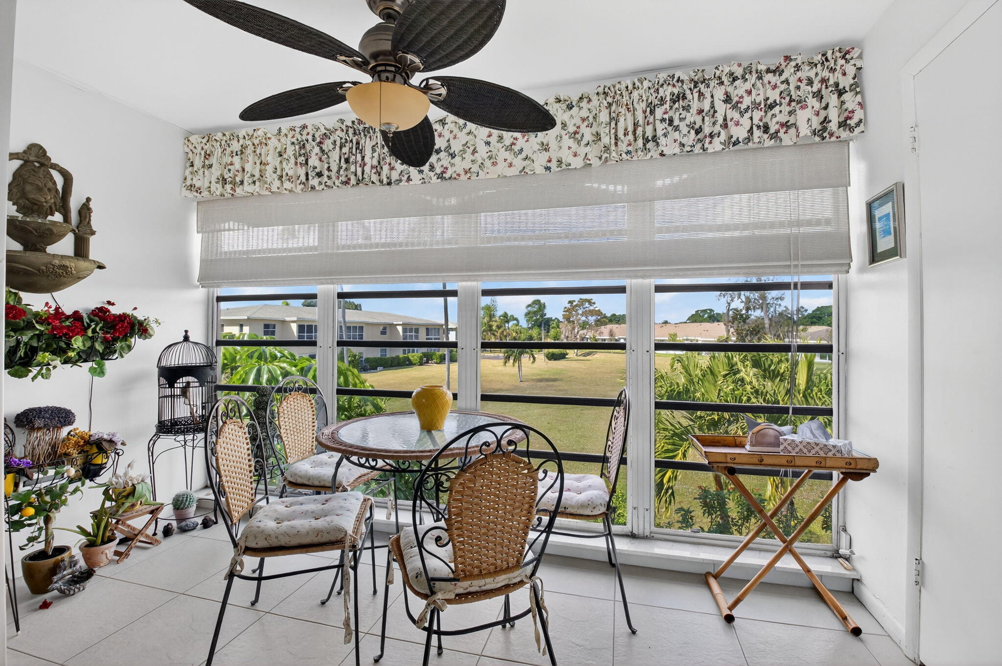 13757 Flora Place, Unit G Delray Beach, FL 33484 - Photo 22 of 58 a view of a dining room with furniture window and outside view