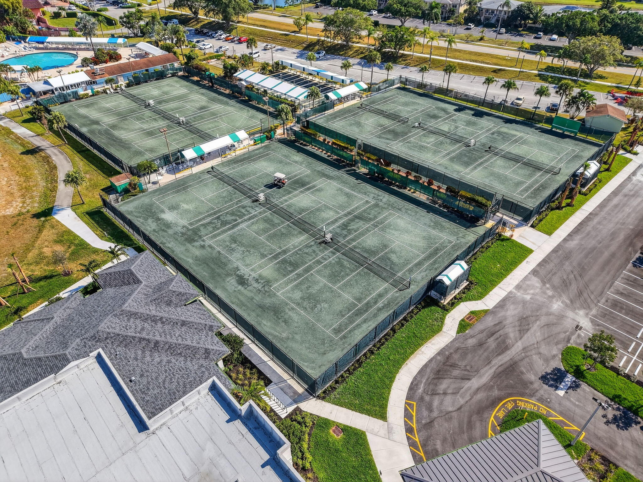 13757 Flora Place, Unit G Delray Beach, FL 33484 - Photo 55 of 58 swimming pool with outdoor seating