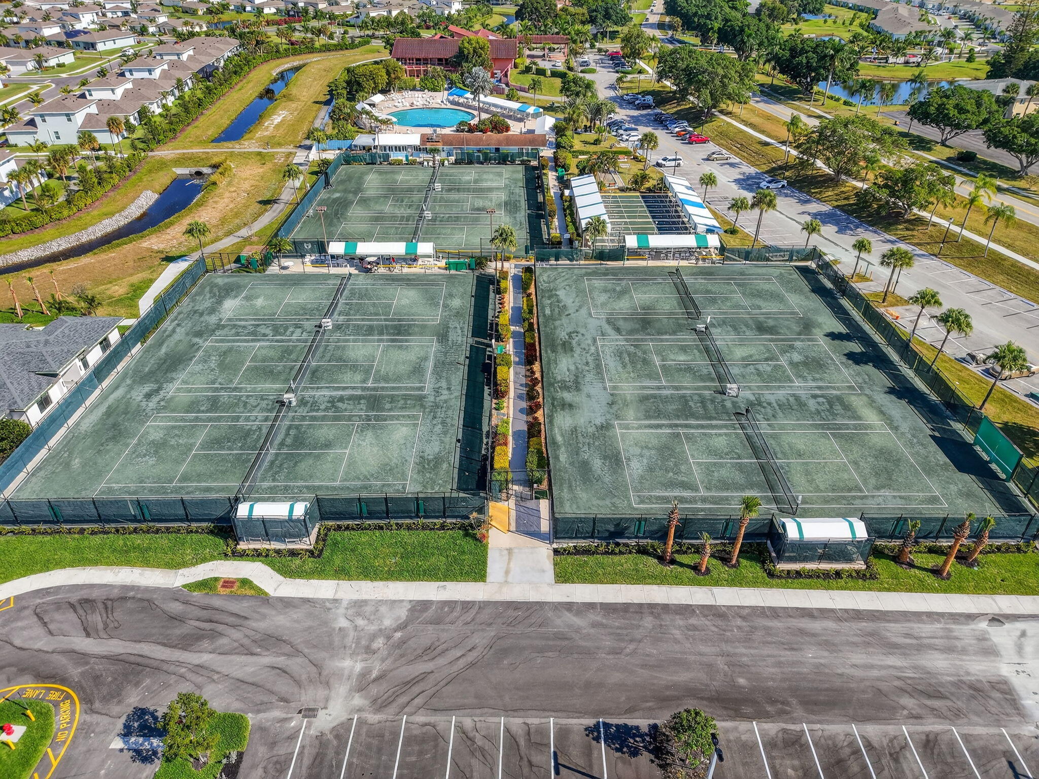 13757 Flora Place, Unit G Delray Beach, FL 33484 - Photo 56 of 58 a view of outdoor space with swimming pool