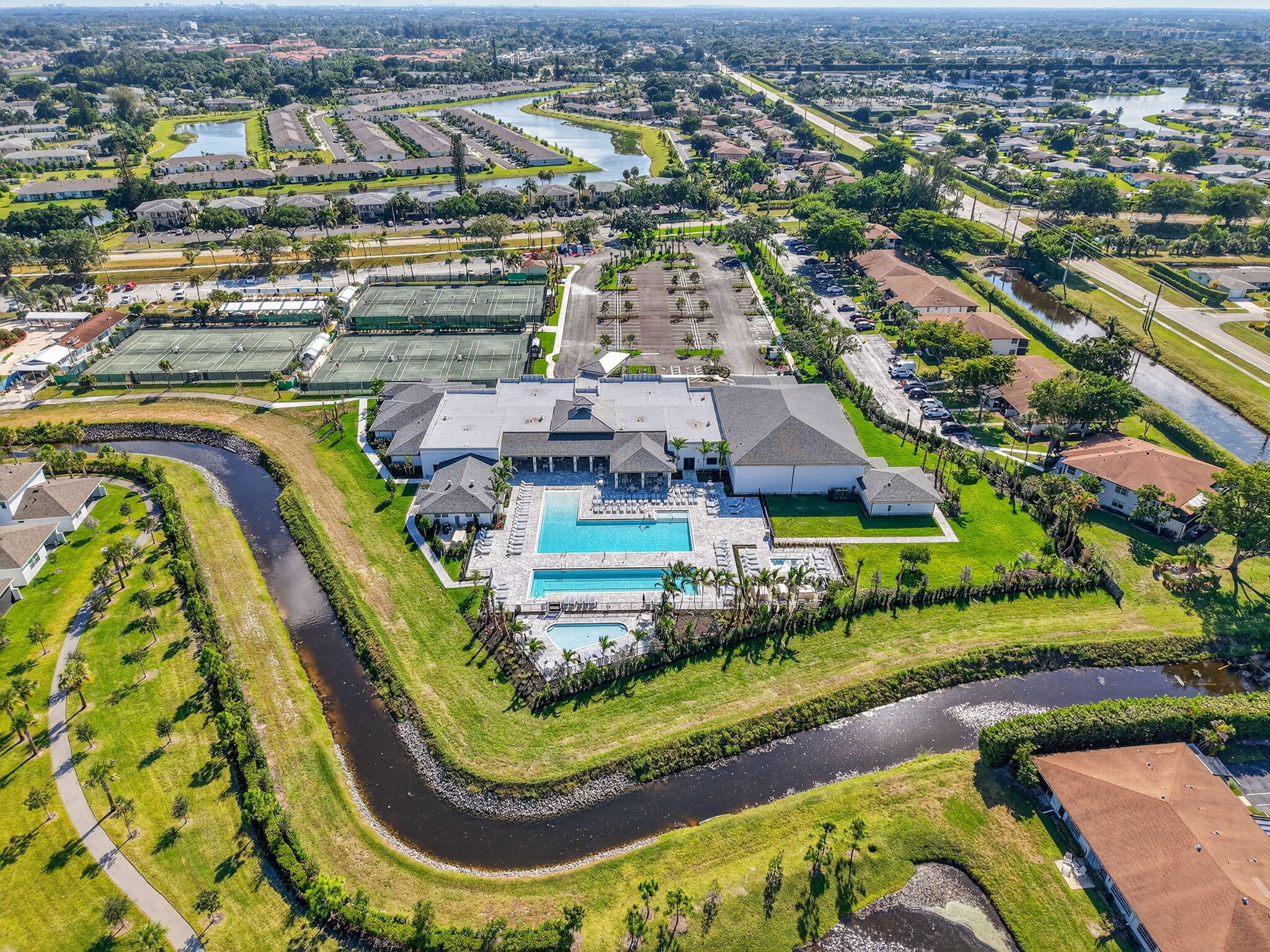 13757 Flora Place, Unit G Delray Beach, FL 33484 - Photo 58 of 58 an aerial view of residential houses with outdoor space