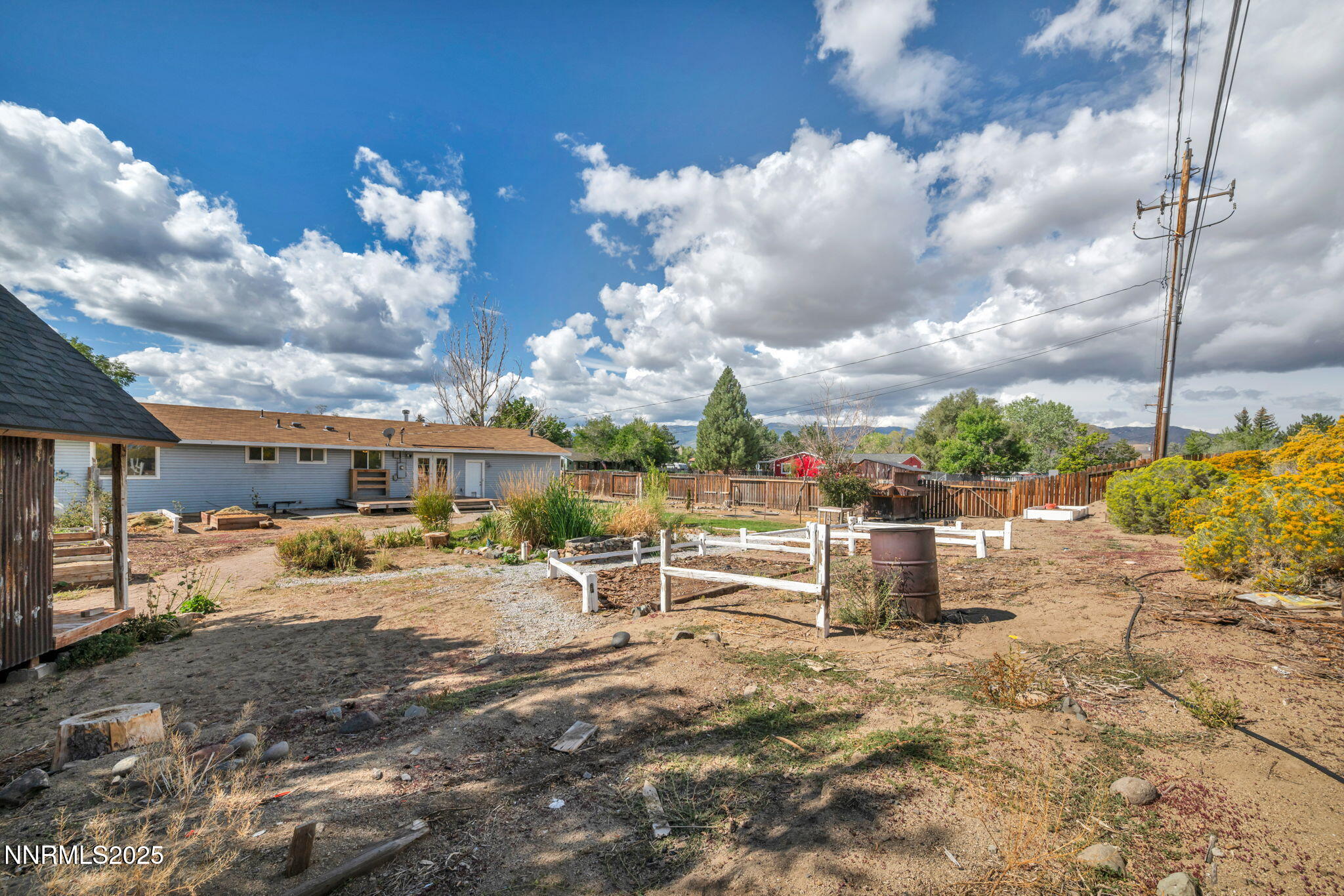 17475 Egret Lane Reno, NV 89508 - Photo 13 of 67 a view of a backyard with sitting area