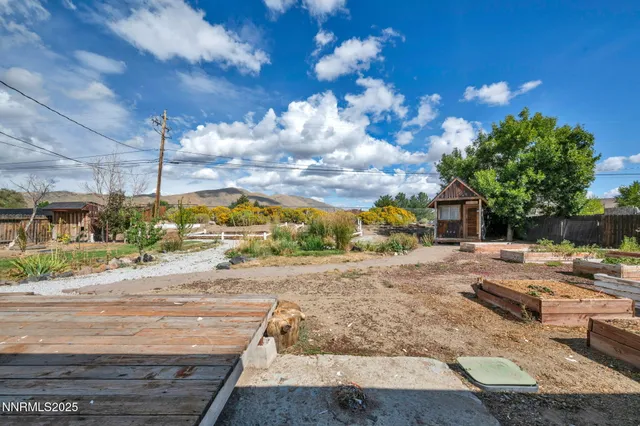 a view of a lake with a building in the background