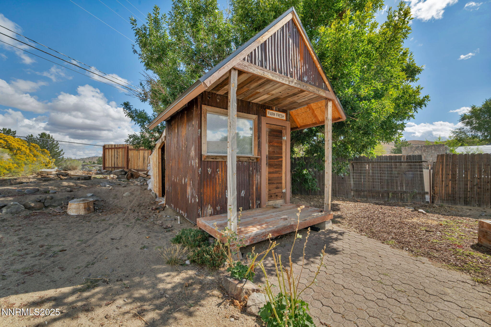 17475 Egret Lane Reno, NV 89508 - Photo 19 of 67 a view of a house with backyard and sitting area